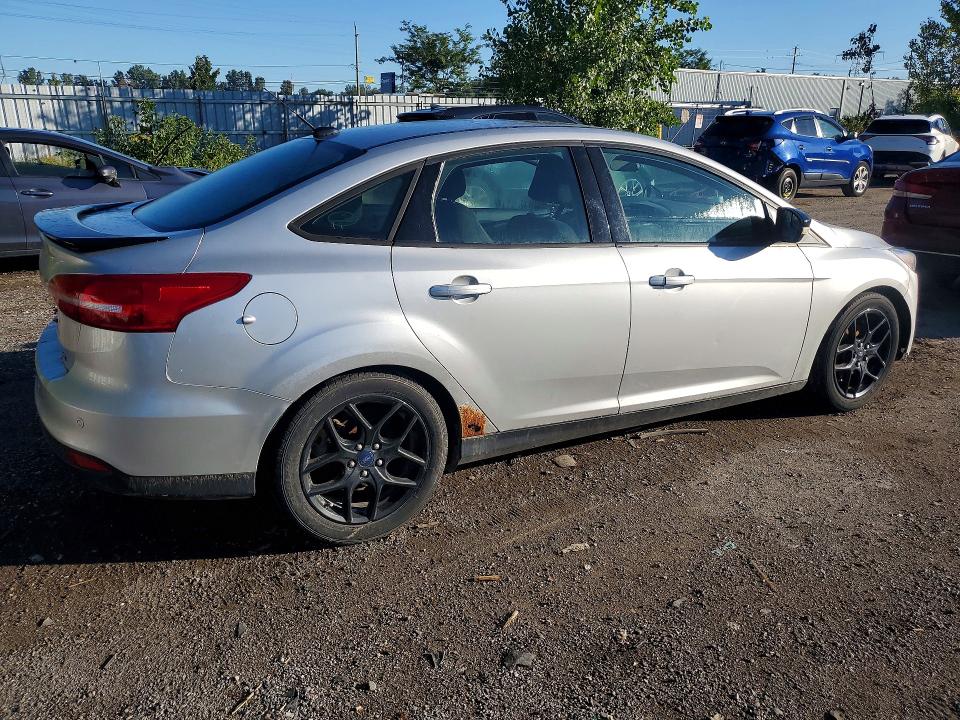 Photo 3 from auction – 2018 FORD FOCUS with VIN 1FADP3H23JL253887