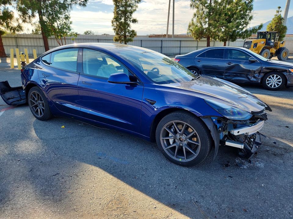 Photo 4 from auction – 2021 TESLA MODEL 3 with VIN 5YJ3E1EB5MF014921