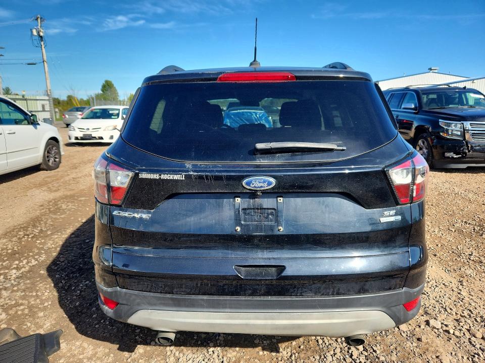 Снимка 6 от търг – 2018 FORD ESCAPE с VIN 1FMCU9GD3JUA14902
