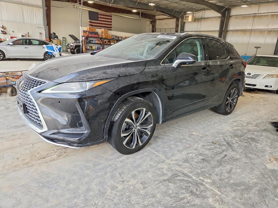 LEXUS RX 2021 with VIN 2T2HZMDAXMC302826 - Photo from auction