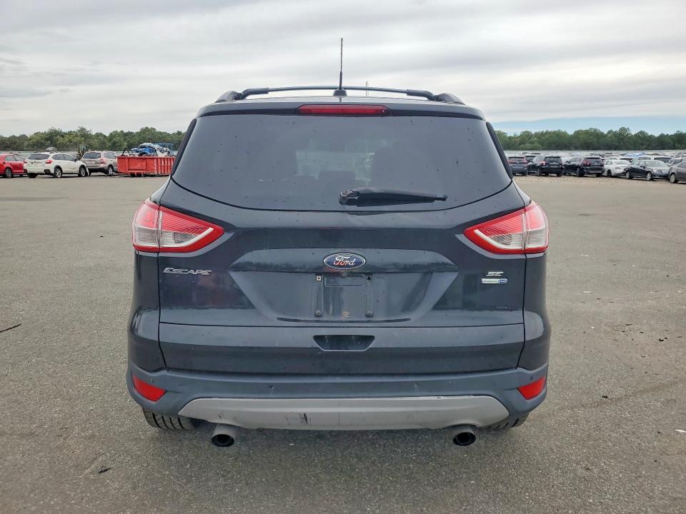 Photo 6 from auction – 2015 FORD ESCAPE with VIN 1FMCU9GX9FUB54521