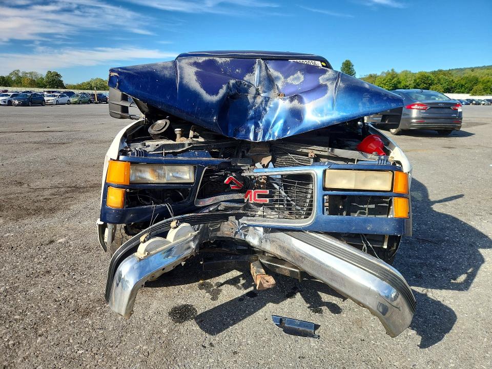 Снимка 5 от търг – 1999 GMC SIERRA с VIN 1GTEK19R3XR507410