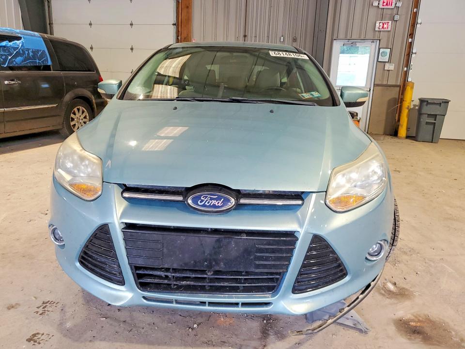 Снимка 5 от търг – 2012 FORD FOCUS с VIN 1FAHP3M26CL238939