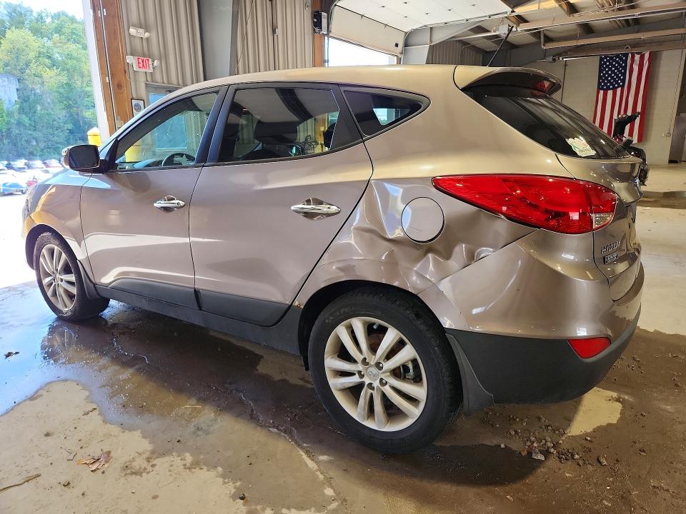 Photo 2 from auction – 2012 HYUNDAI TUCSON with VIN KM8JUCAC1CU375682