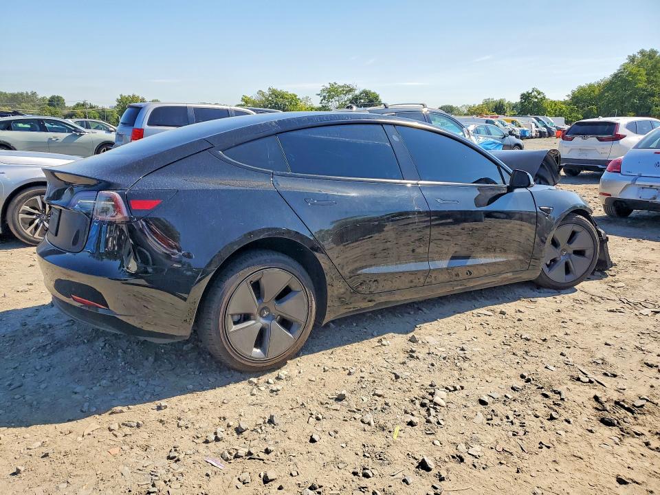 Снимка 3 от търг – 2023 TESLA MODEL 3 с VIN 5YJ3E1EA2PF512313