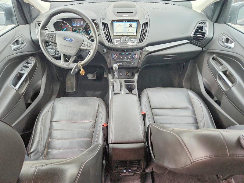 Photo 8 from auction – 2017 FORD ESCAPE with VIN 1FMCU9J94HUD57989