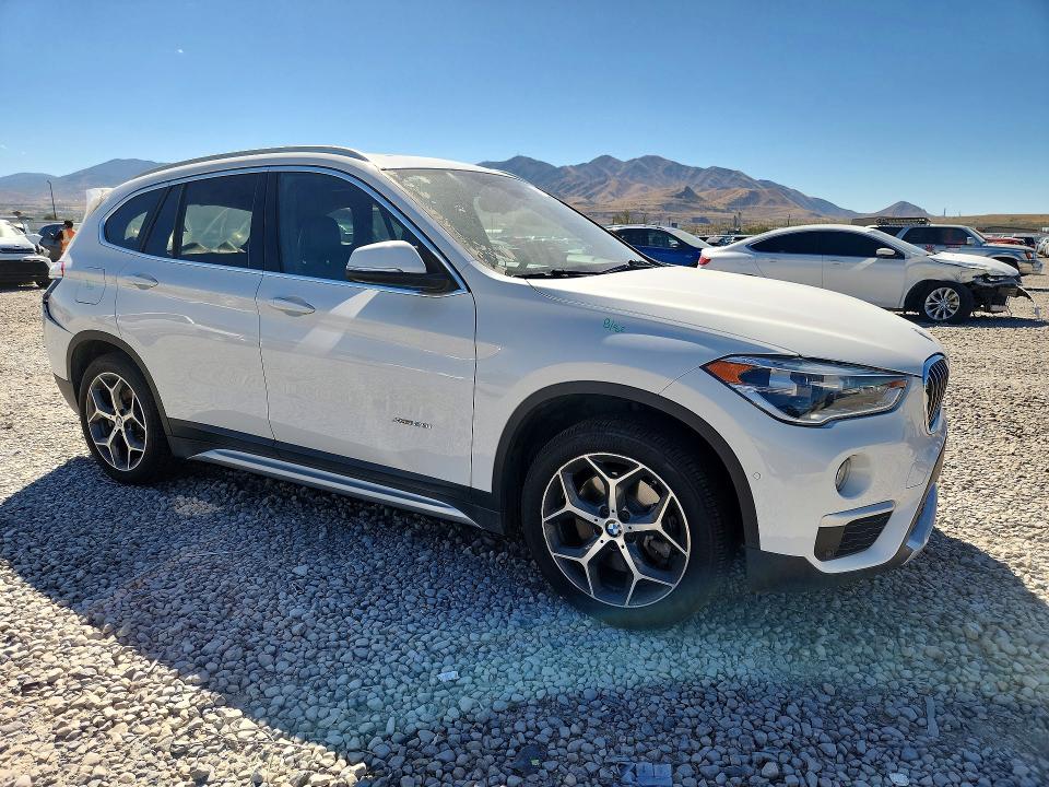 Photo 4 from auction – 2017 BMW X1 with VIN WBXHT3C37H5F80725