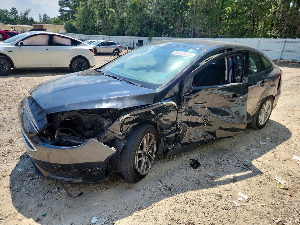 FORD FOCUS 2015 with VIN 1FADP3F2XFL365046 - Photo from auction