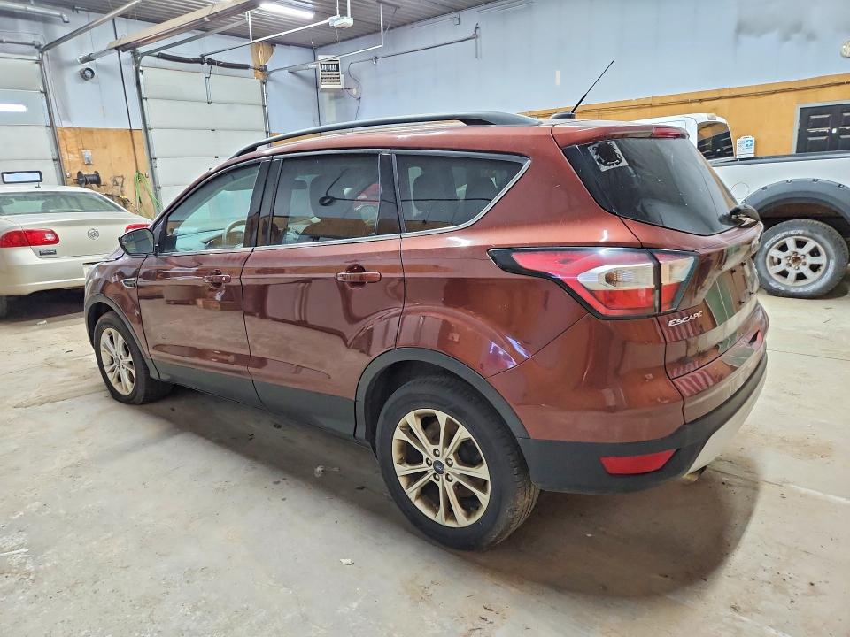 Photo 2 from auction – 2018 FORD ESCAPE with VIN 1FMCU9GDXJUA43703