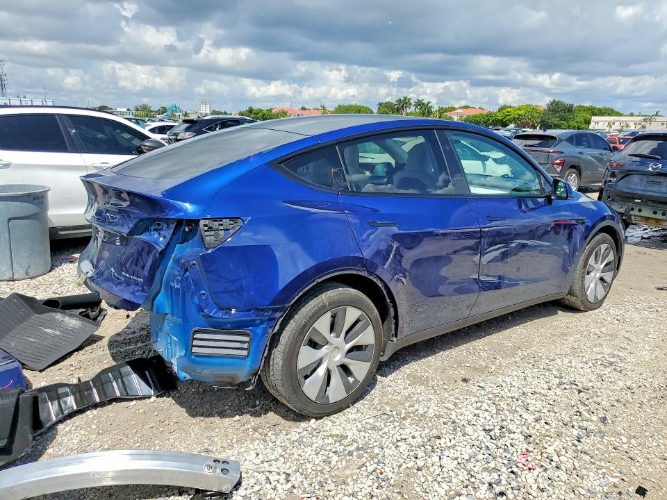 Снимка 3 от търг – 2023 TESLA MODEL Y с VIN 7SAYGAEE8PF801427