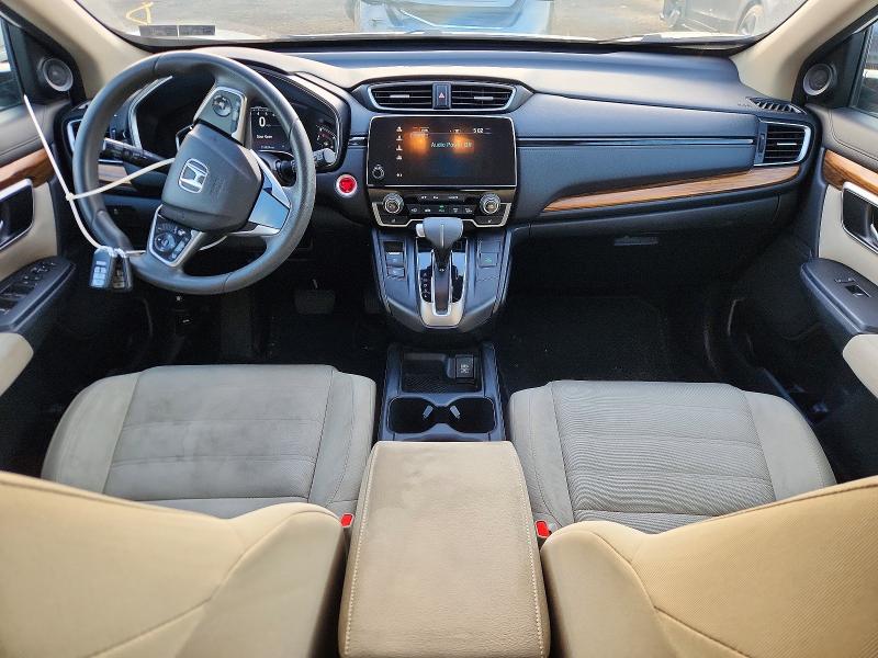 Photo 8 from auction – 2018 HONDA CR-V with VIN 2HKRW2H5XJH667941