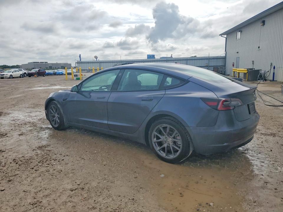 Снимка 2 от търг – 2022 TESLA MODEL 3 с VIN 5YJ3E1EA0NF288827