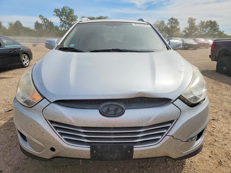 Photo 5 from auction – 2012 HYUNDAI TUCSON with VIN KM8JUCAC1CU430213