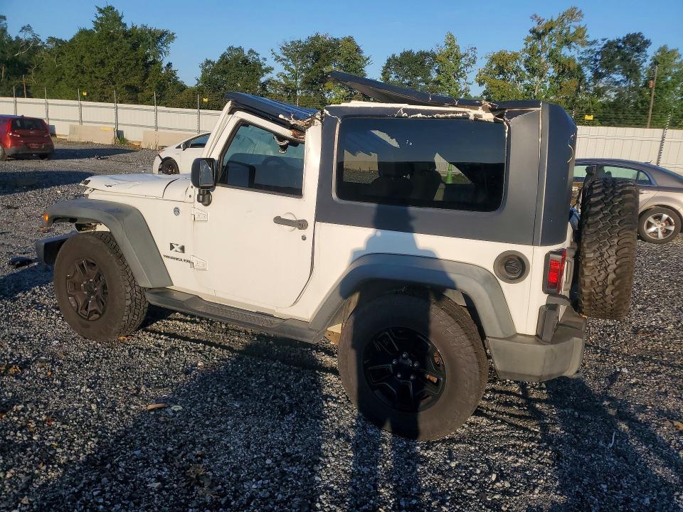 Снимка 2 от търг – 2009 JEEP WRANGLER с VIN 1J4FA24149L733387