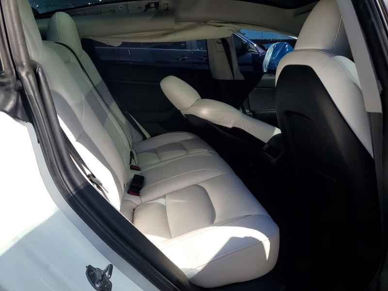 Снимка 10 от търг – 2023 TESLA MODEL 3 с VIN 5YJ3E1EA2PF510058