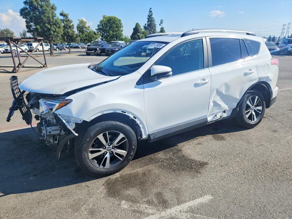 TOYOTA RAV4 2017 with VIN 2T3RFREVXHW587698 - Photo from auction