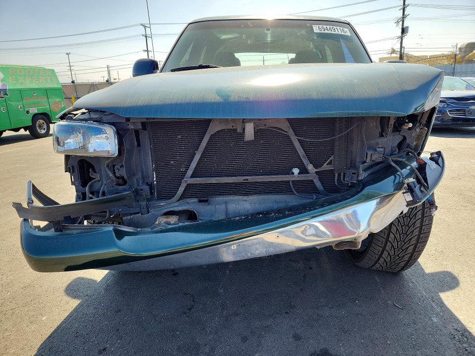 Снимка 5 от търг – 2003 GMC YUKON с VIN 1GKEC13VX3J301145