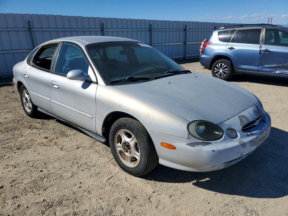 Photo 4 from auction – 1999 FORD TAURUS with VIN 1FAFP53U1XG111441