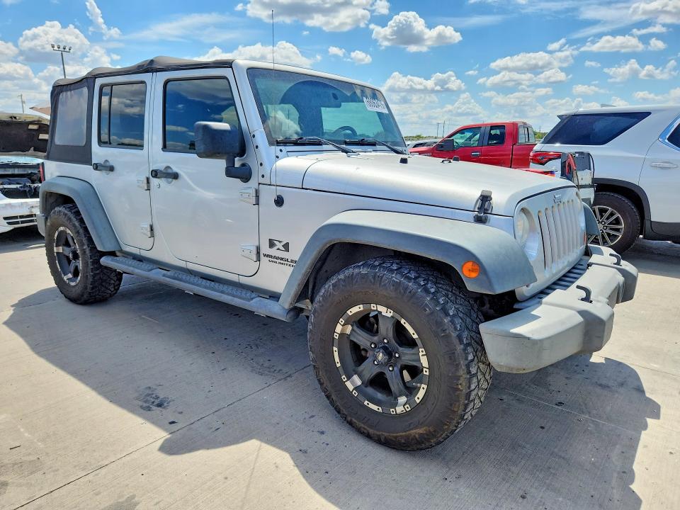 Photo 4 from auction – 2009 JEEP WRANGLER UNLIMITED with VIN 1J4GB39129L742847