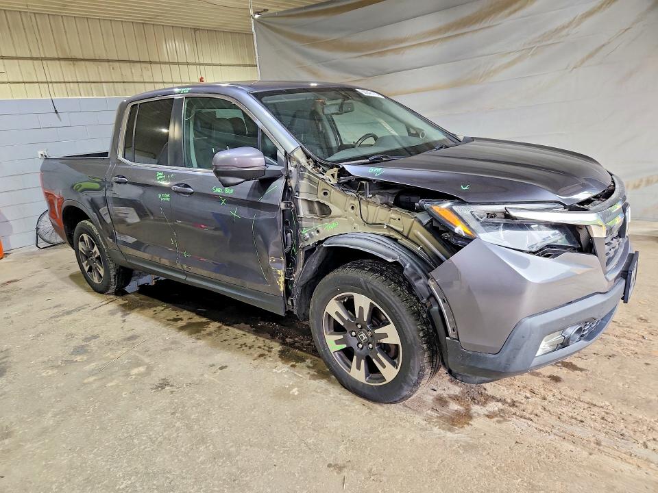 Photo 4 from auction – 2017 HONDA RIDGELINE with VIN 5FPYK3F65HB023692