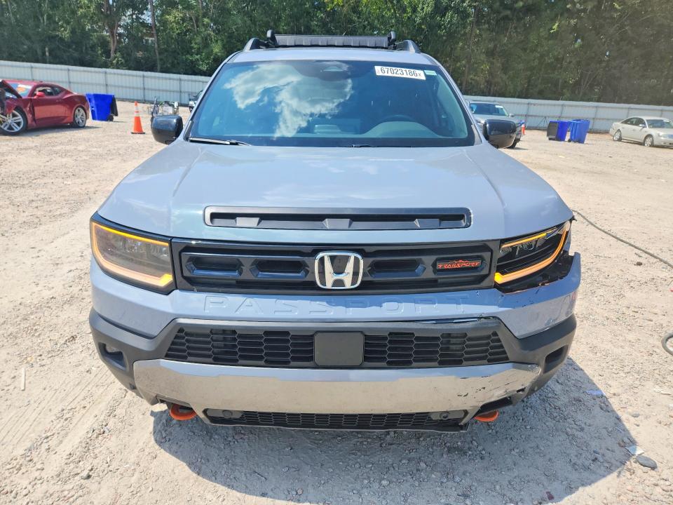Photo 5 from auction – 2026 HONDA PASSPORT with VIN 5FNYF9H55TB041607