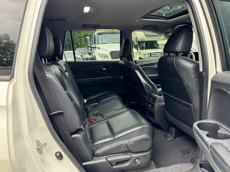 Photo 11 from auction – 2018 HONDA PILOT with VIN 5FNYF6H52JB041110