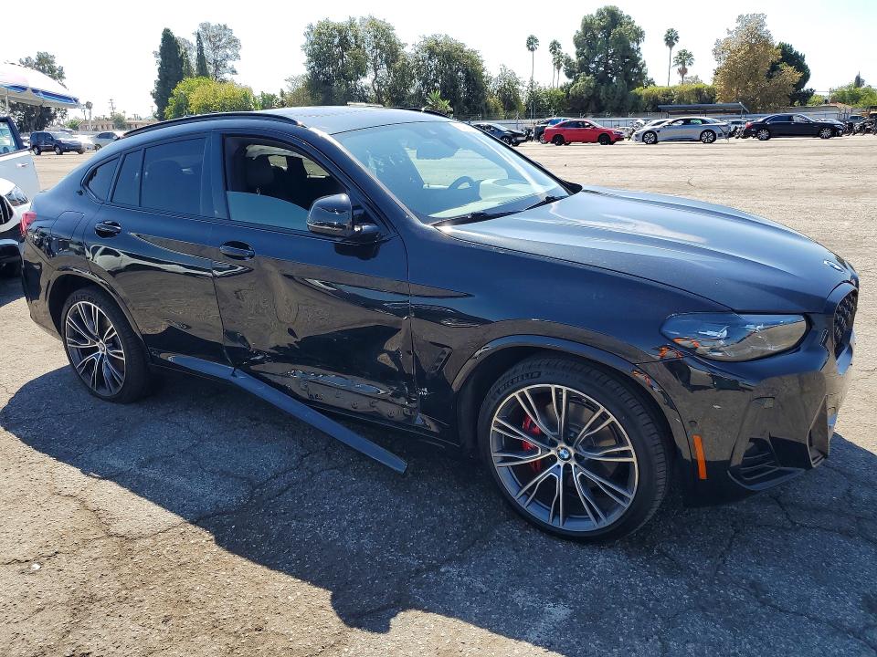 Photo 4 from auction – 2023 BMW X4 with VIN 5UX33DT00P9P58271