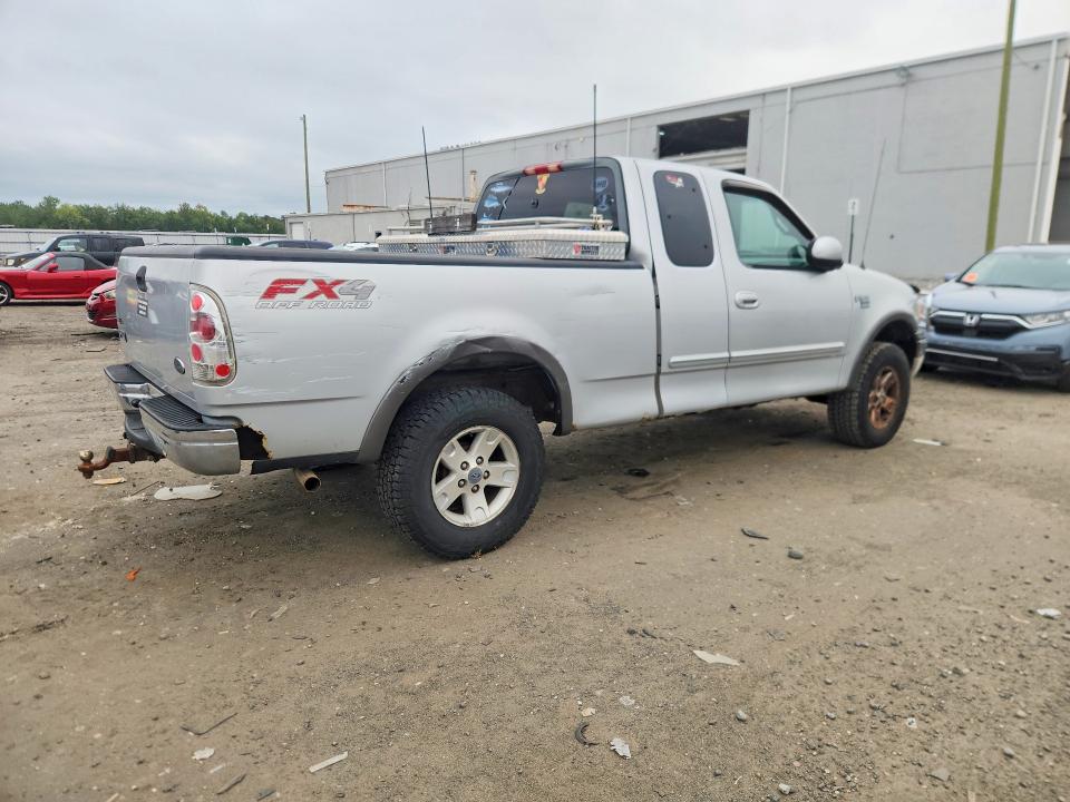 Photo 3 from auction – 2002 FORD F150 with VIN 1FTRX18L82NA86266