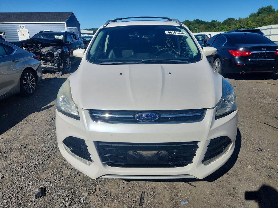 Photo 5 from auction – 2016 FORD ESCAPE with VIN 1FMCU9JX4GUC04669