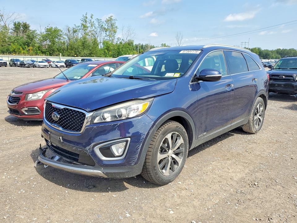 KIA SORENTO 2016 with VIN 5XYPHDA59GG018638 - Photo from auction