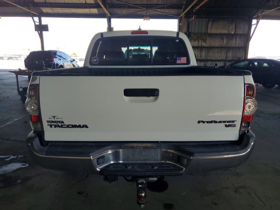 Photo 6 from auction – 2014 TOYOTA TACOMA with VIN 3TMJU4GN2EM158765