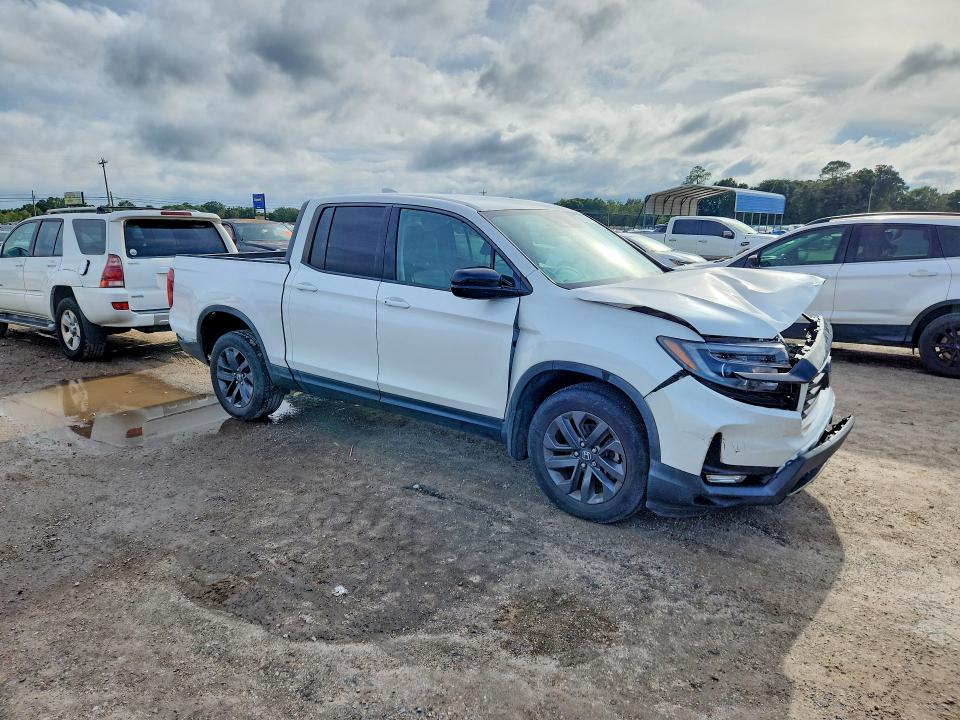 Photo 4 from auction – 2021 HONDA RIDGELINE with VIN 5FPYK3F14MB014450