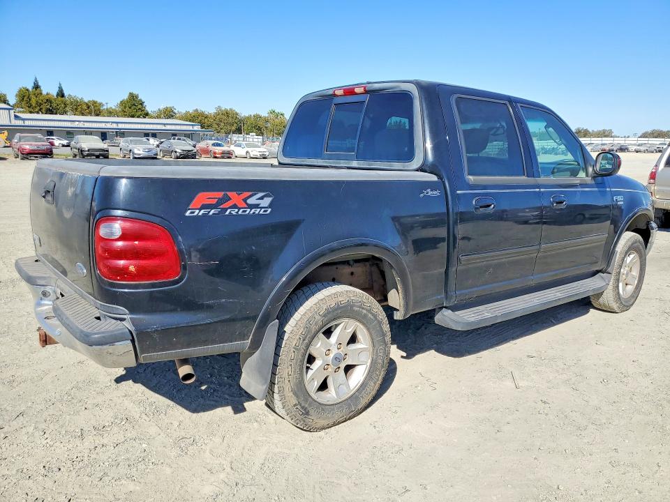 Снимка 3 от търг – 2003 FORD F150 с VIN 1FTRW08L83KB62813