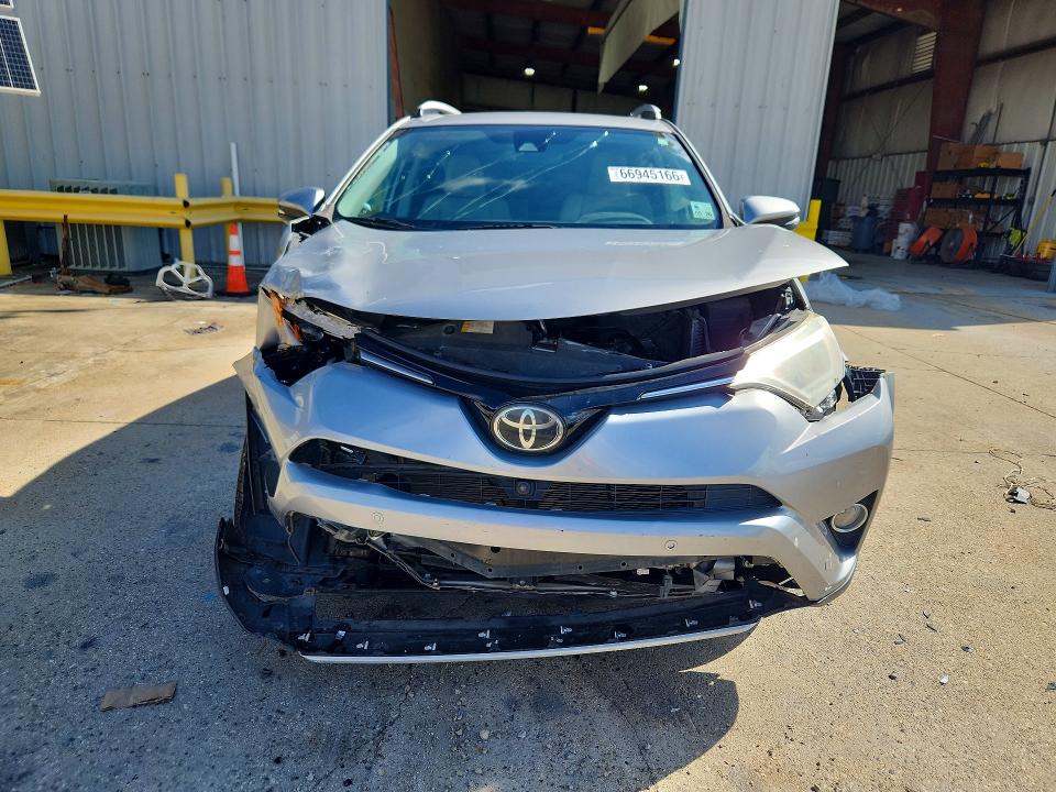 Photo 5 from auction – 2016 TOYOTA RAV4 with VIN 2T3YFREV3GW273532