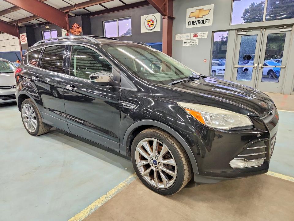 Photo 4 from auction – 2014 FORD ESCAPE with VIN 1FMCU9GX9EUD62171
