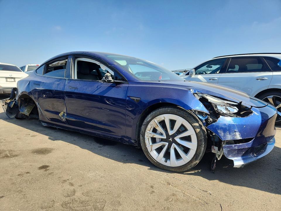 Photo 4 from auction – 2022 TESLA MODEL 3 with VIN 5YJ3E1EB8NF143088
