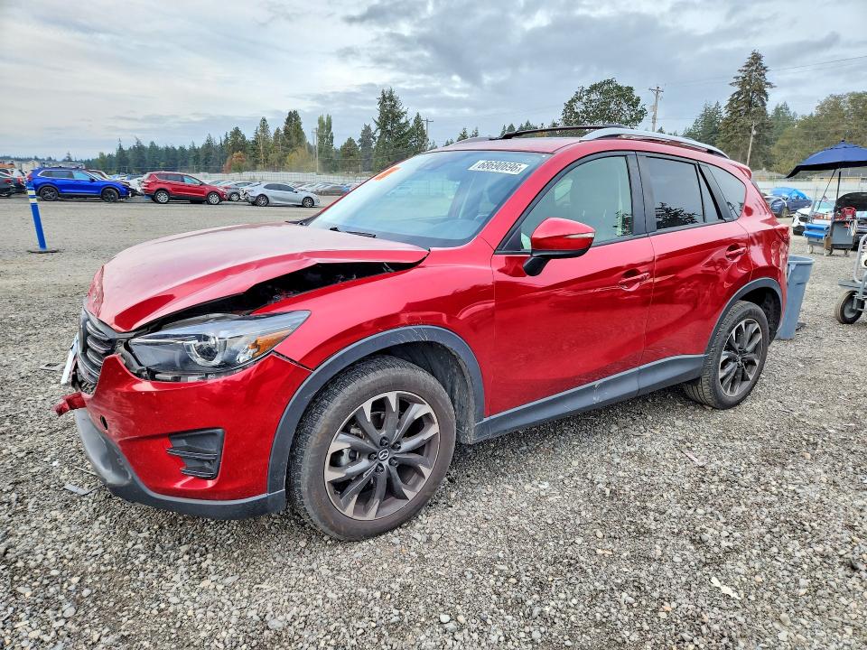 MAZDA CX-5 2016 con VIN JM3KE4DY1G0676699 - Foto de la subasta