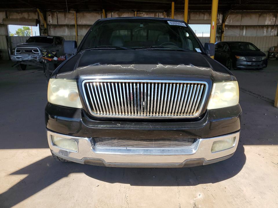 Photo 5 from auction – 2005 FORD F150 with VIN 1FTPW12555FA38792