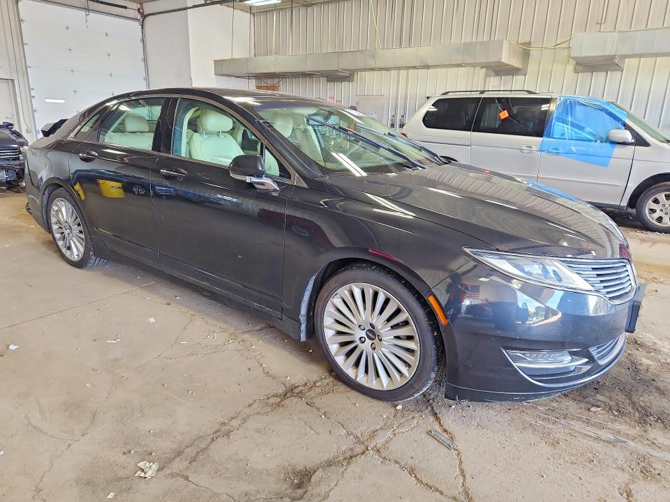 Foto 4 de la subasta – 2015 LINCOLN MKZ con VIN 3LN6L2LU2FR604889
