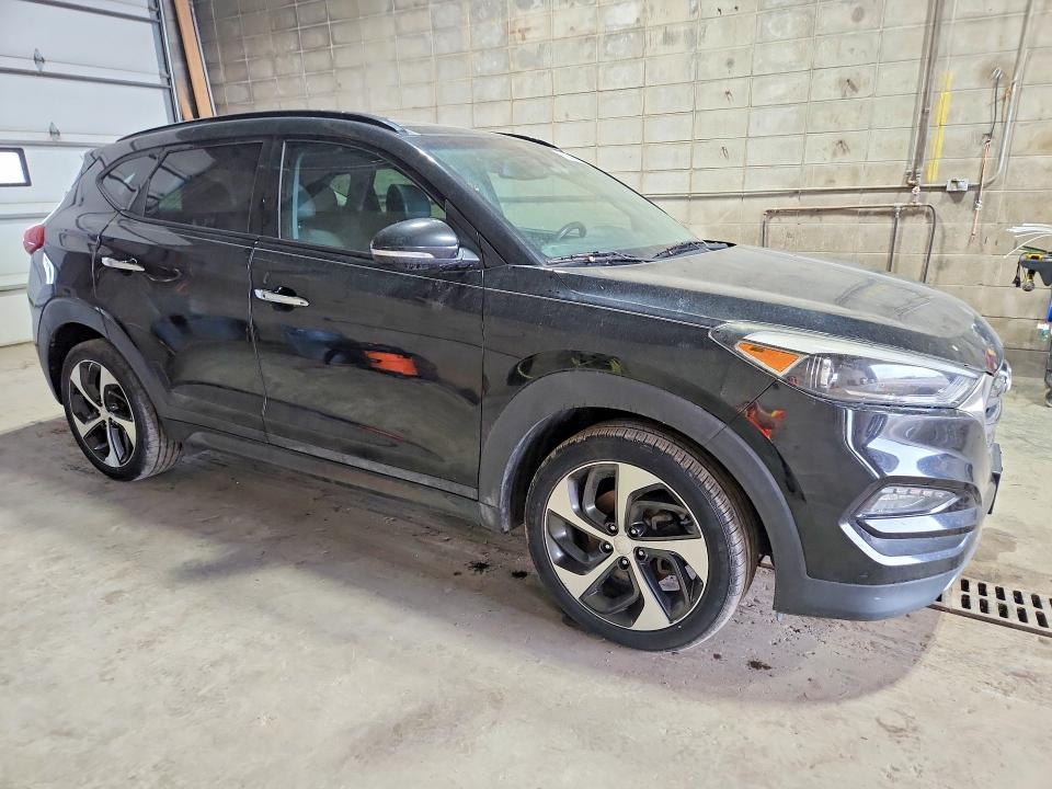 Снимка 4 от търг – 2016 HYUNDAI TUCSON с VIN KM8J3CA25GU123692