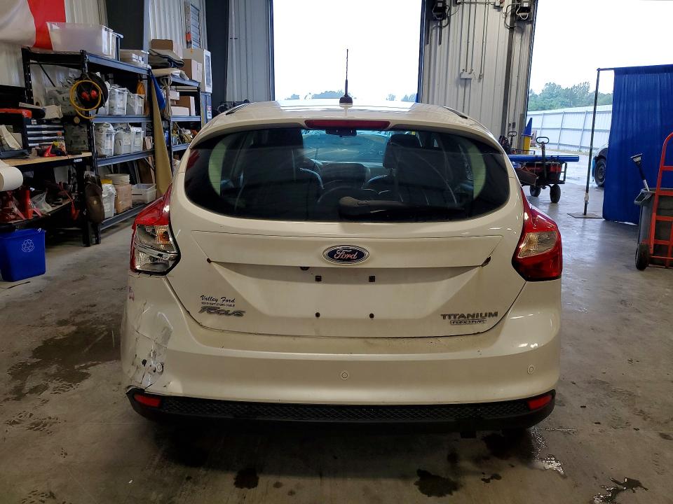 Снимка 6 от търг – 2012 FORD FOCUS с VIN 1FAHP3N2XCL418164