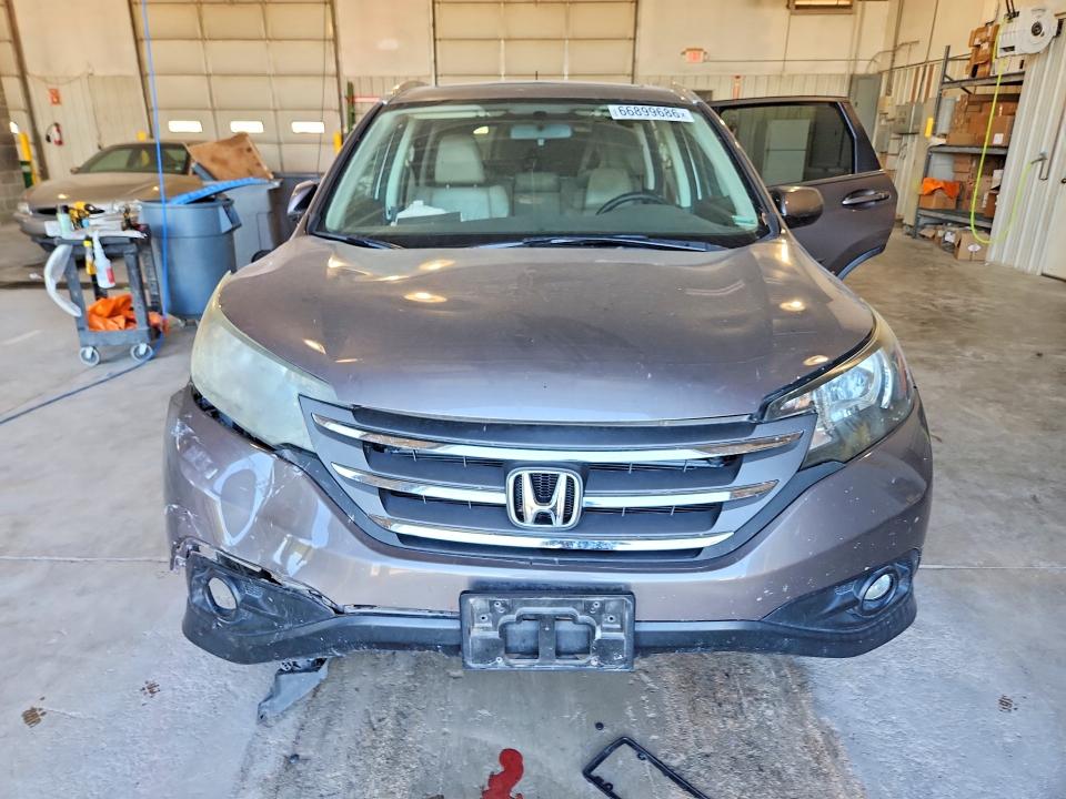 Photo 5 from auction – 2014 HONDA CR-V with VIN 2HKRM4H71EH621620