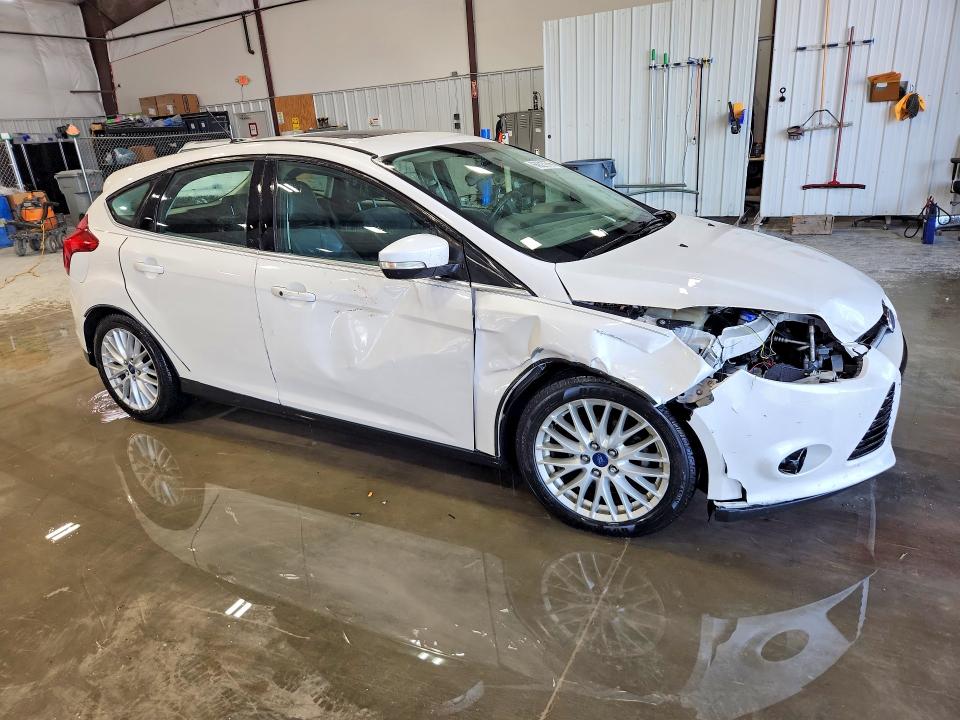 Photo 4 from auction – 2014 FORD FOCUS with VIN 1FADP3N21EL395620