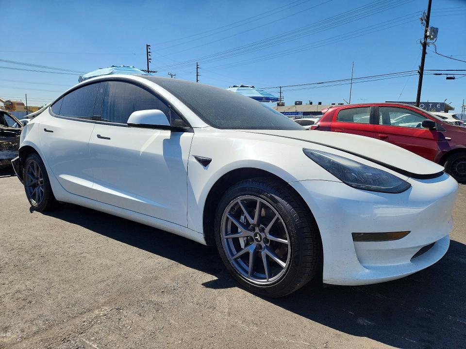 Photo 4 from auction – 2023 TESLA MODEL 3 with VIN 5YJ3E1EA1PF458440