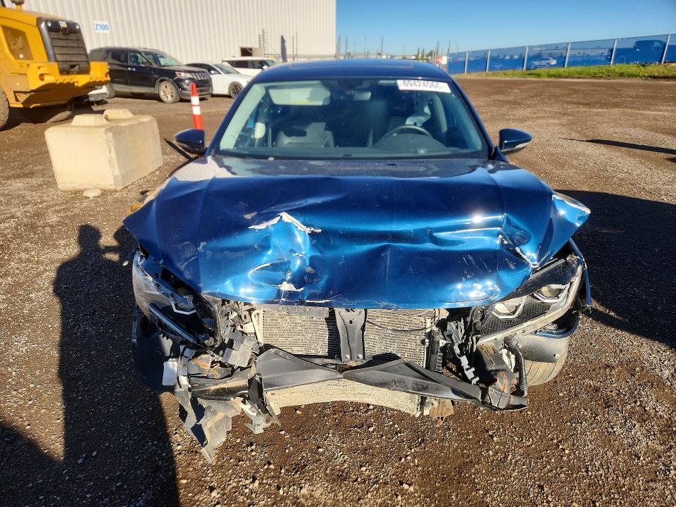 Photo 5 from auction – 2021 VOLKSWAGEN PASSAT with VIN 1VWBA7A32MC019139
