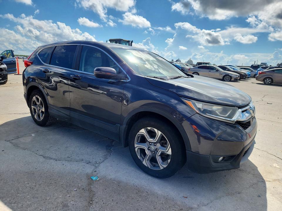 Photo 4 from auction – 2019 HONDA CR-V with VIN 5J6RW1H85KA019897