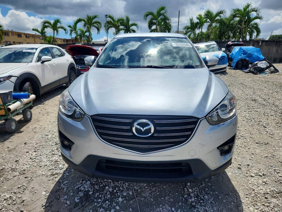 Photo 5 from auction – 2016 MAZDA CX-5 with VIN JM3KE2CYXG0816559