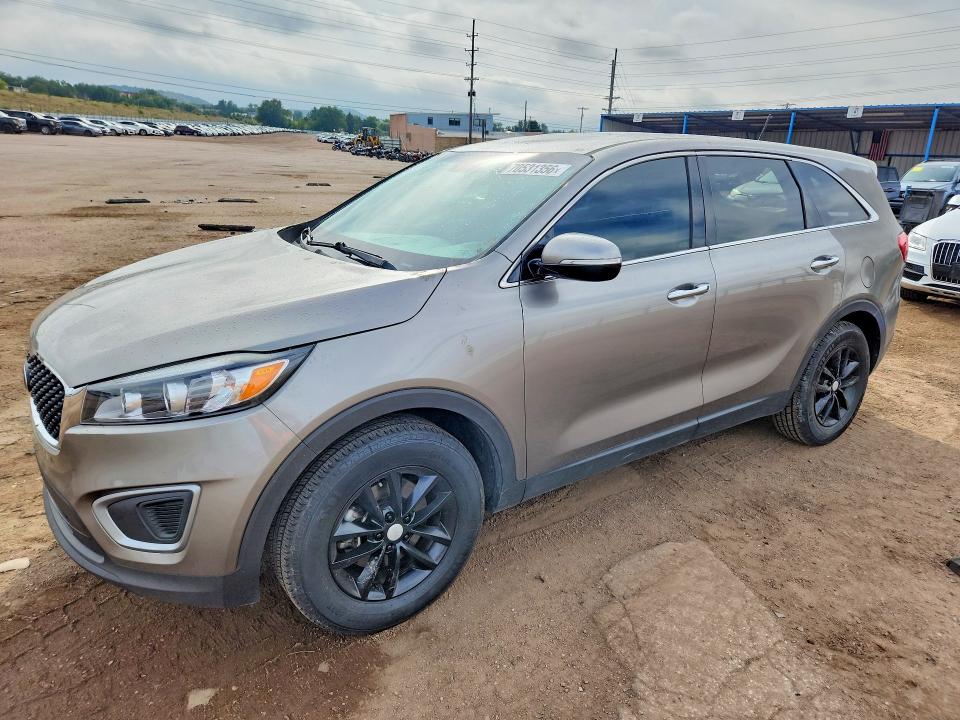 KIA SORENTO 2016 with VIN 5XYPG4A34GG164818 - Photo from auction