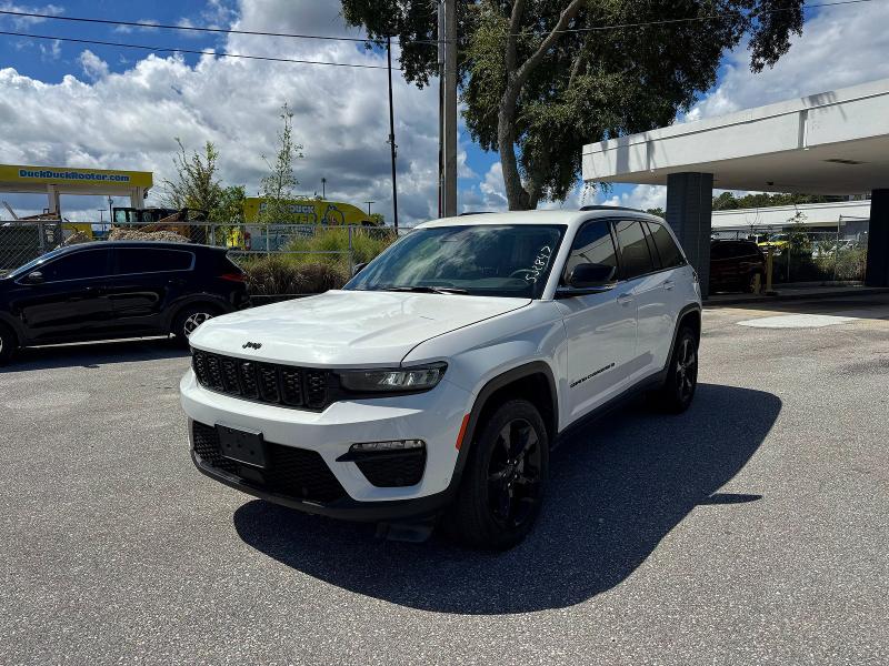 Photo 2 from auction – 2023 JEEP GRAND CHEROKEE with VIN 1C4RJGBG2PC502847