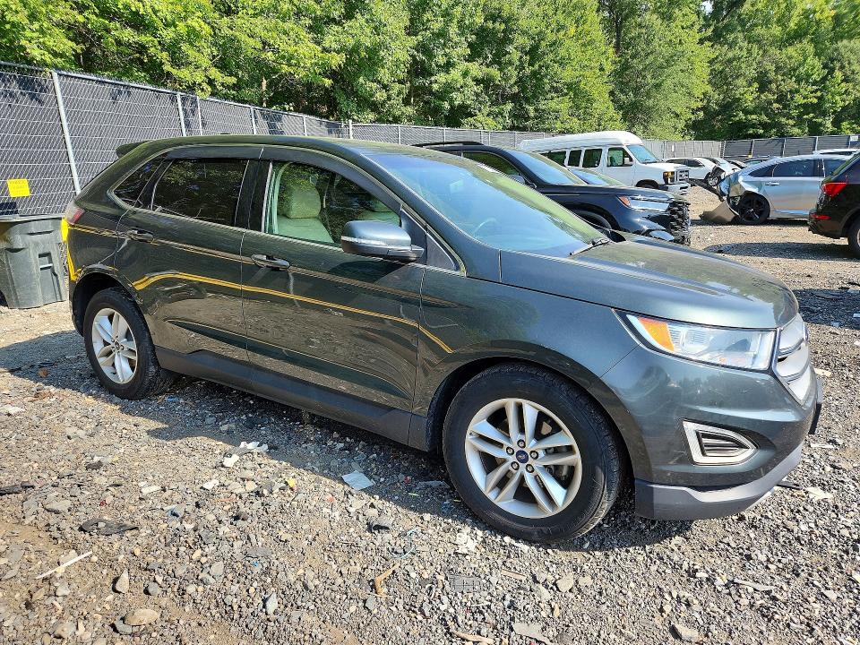 Photo 4 from auction – 2015 FORD EDGE with VIN 2FMTK3J84FBB19833